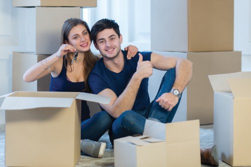 Removal team planning a house move in Chelsea street setting