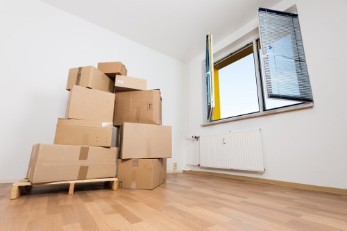Moving team preparing items safely for a Chelsea van service