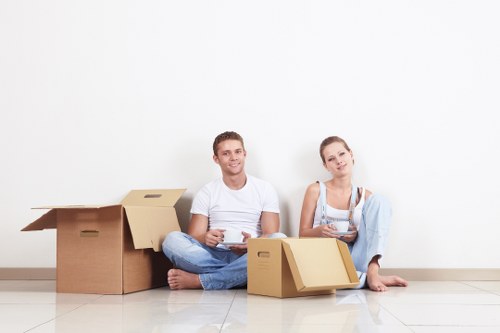 Moving van and packed boxes for house removals in Chelsea