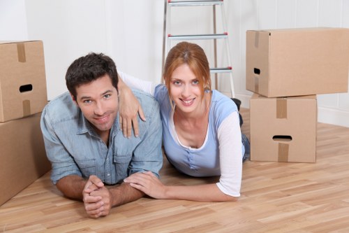 Commercial relocation team handling business equipment in a Chelsea building