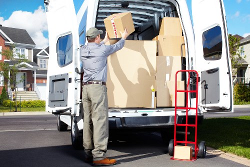 Office relocation scene in Chelsea with organised moving equipment