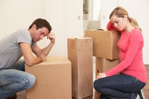 Professional movers handling office equipment in Chelsea