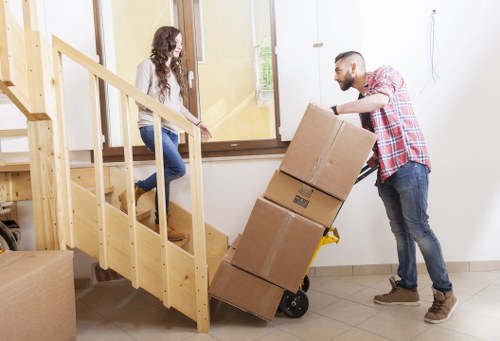 Moving van outside a Chelsea townhouse during relocation