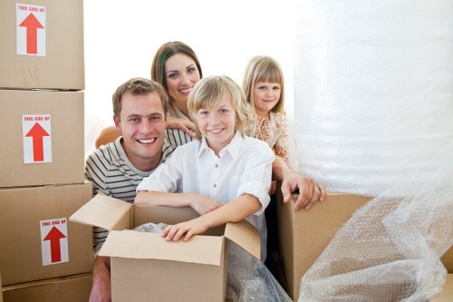 Packed boxes and furniture prepared for removal services in Chelsea