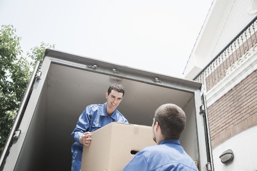 Organised unpacking of boxes into a Chelsea apartment after relocation